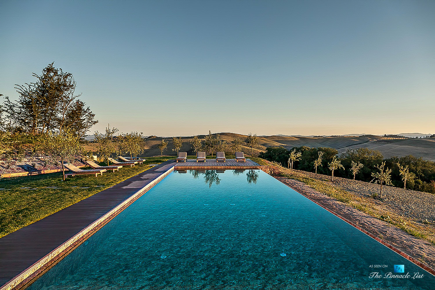 Podere Paníco Estate – Monteroni d’Arbia, Tuscany, Italy – Property Outdoor Pool and Deck View – Luxury Real Estate – Tuscan Villa