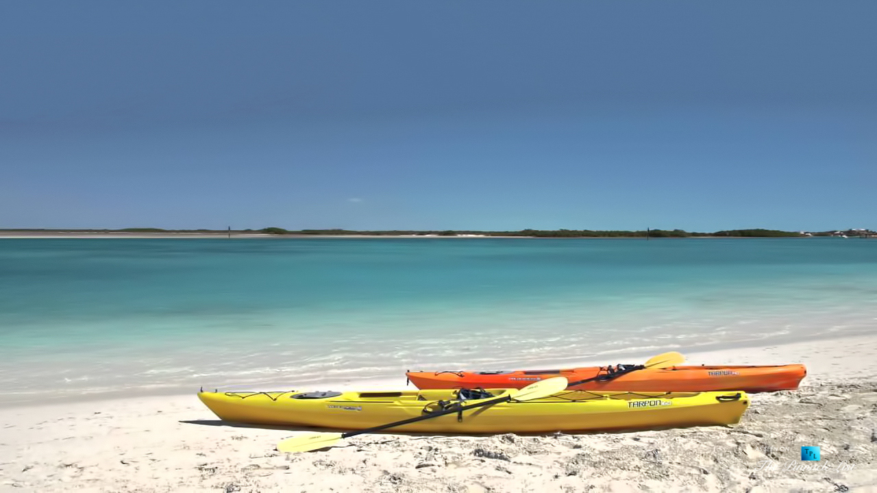 Villa Aquazure - Providenciales, Turks and Caicos Islands - Beach Ocean Kayaks - Luxury Real Estate - Beachfront Home