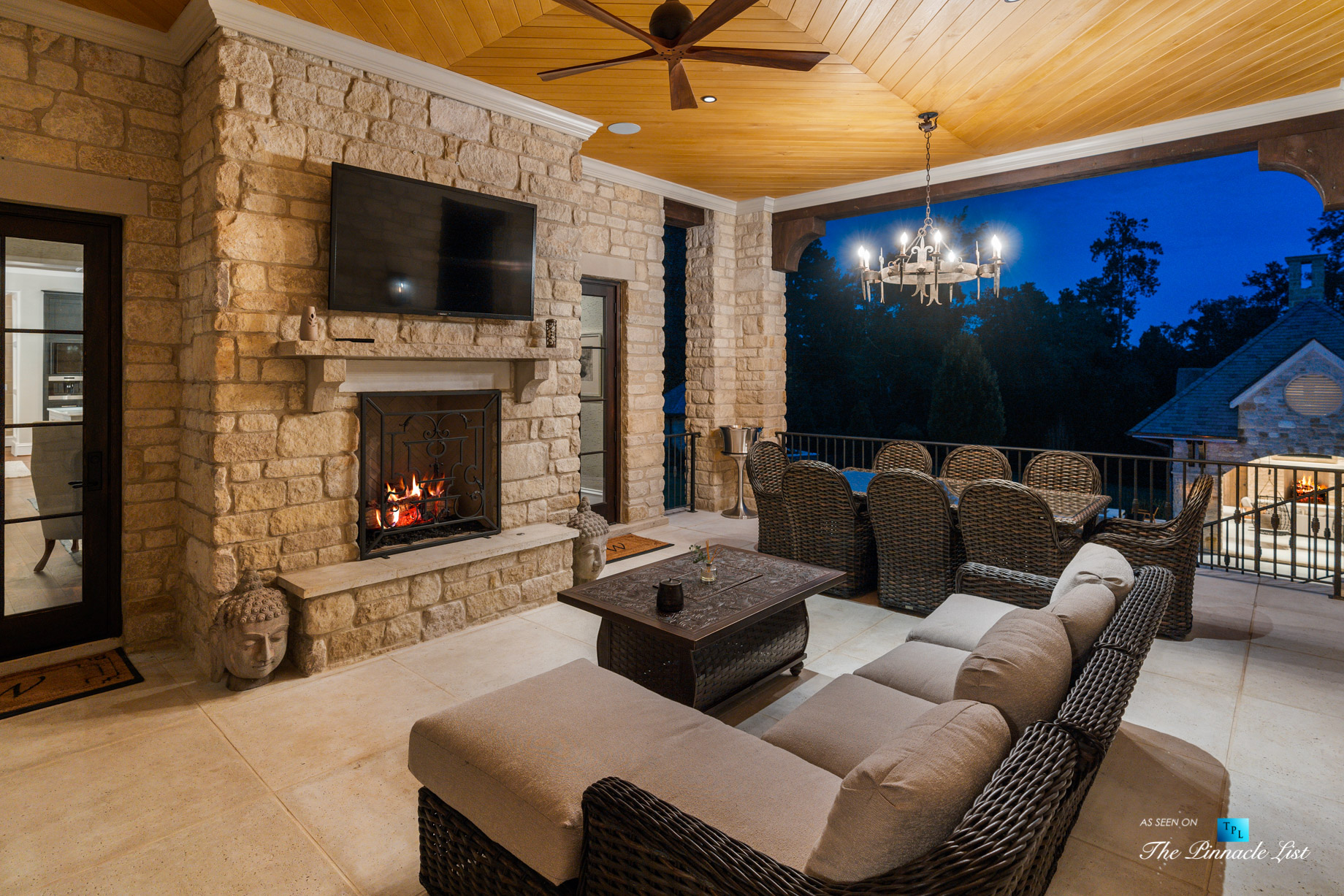 1150 W Garmon Rd, Atlanta, GA, USA – Covered Deck with Fireplace at Night – Luxury Real Estate – Buckhead Estate House