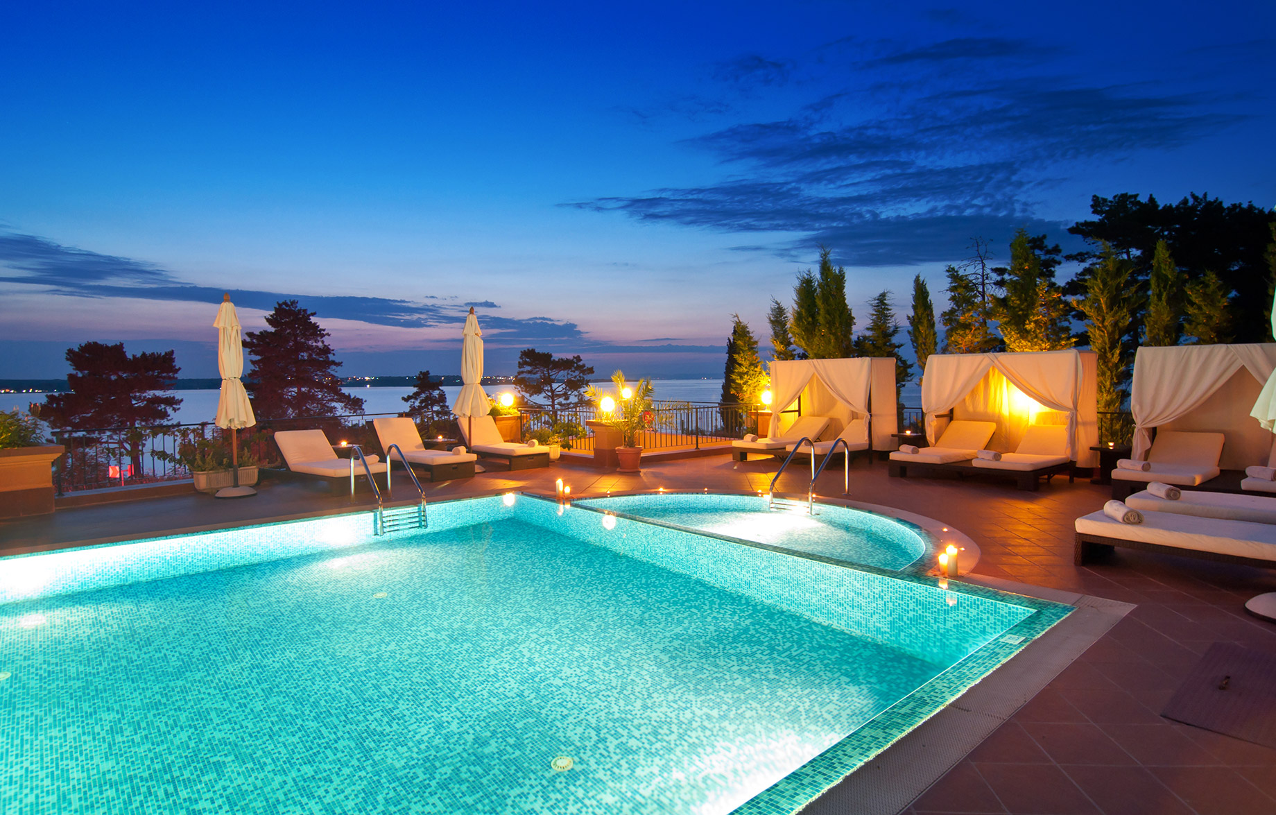 Luxury Travel - Poolside at Night with Sea Views