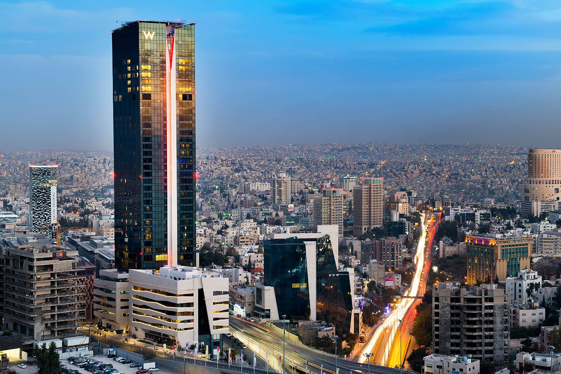 W Amman Luxury Hotel – Amman, Jordan – Hotel Tower Exterior Sunset