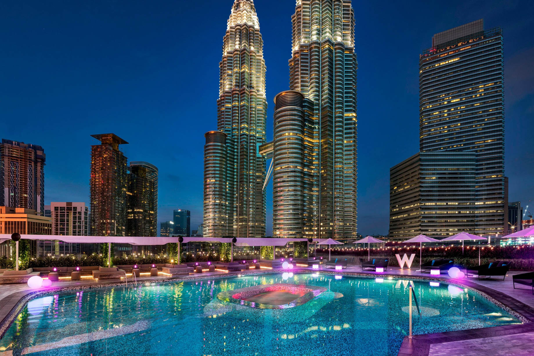 W Kuala Lumpur Luxury Hotel - Kuala Lumpur, Malaysia - WET Outdoor Pool Petronis Towers Night View