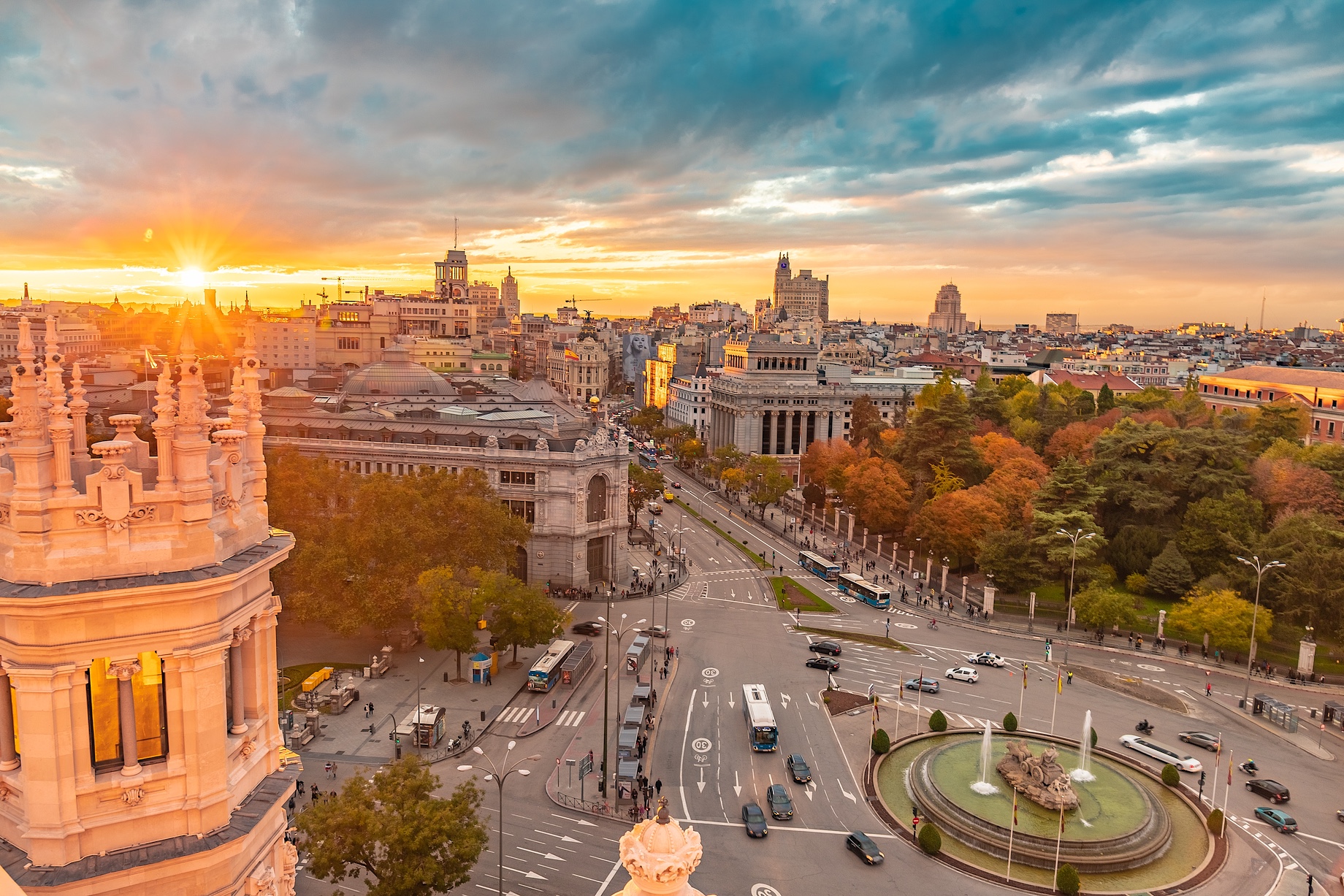 From the Cybele Palace the skyline of Madrid, Spain. View of the sunset in the Spanish capital city more tourist and visited of Europe with new and old buildings