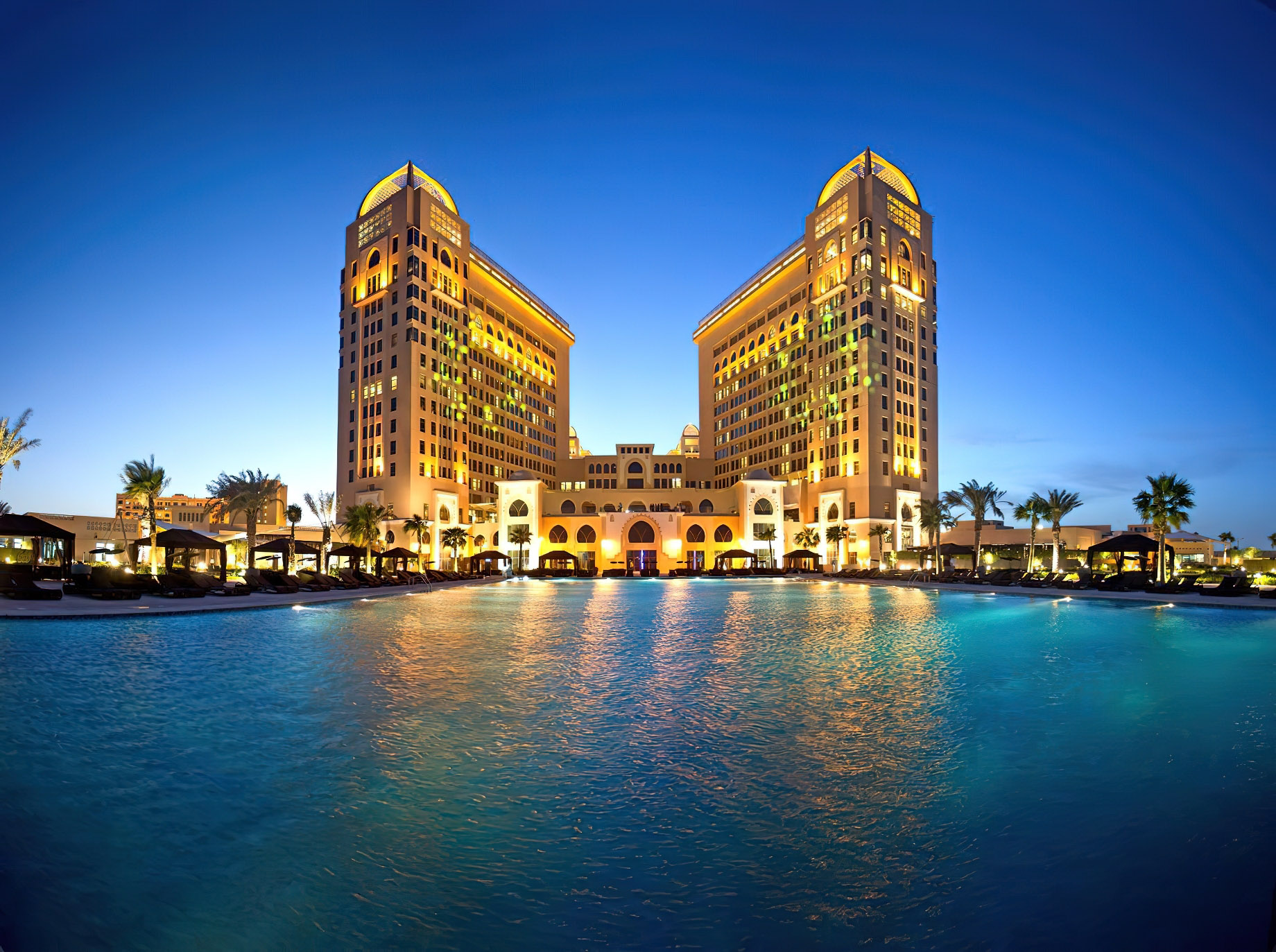 The St. Regis Doha Luxury Hotel - Doha, Qatar - Resort Night Pool View