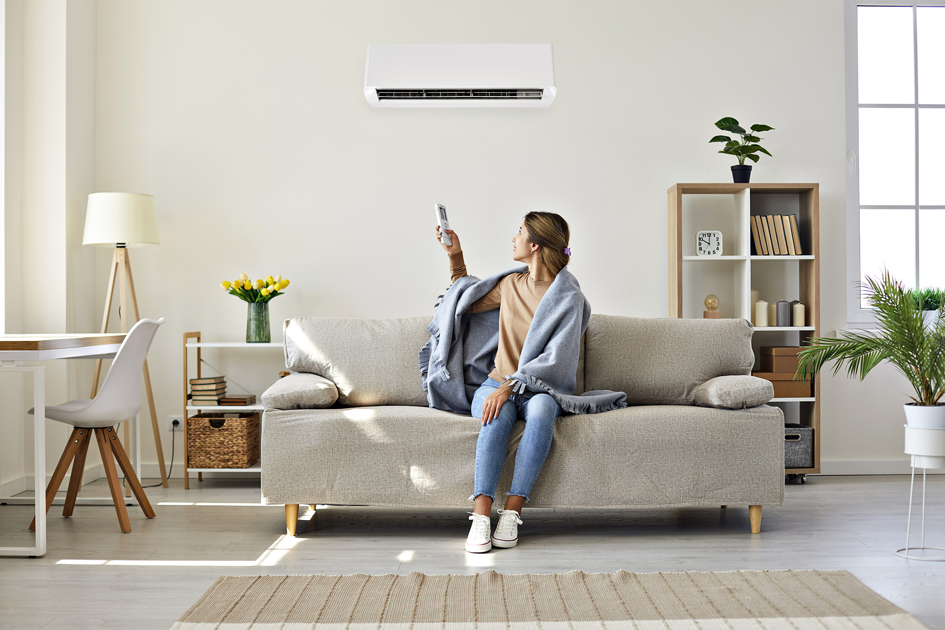 Woman Using Modern AC System