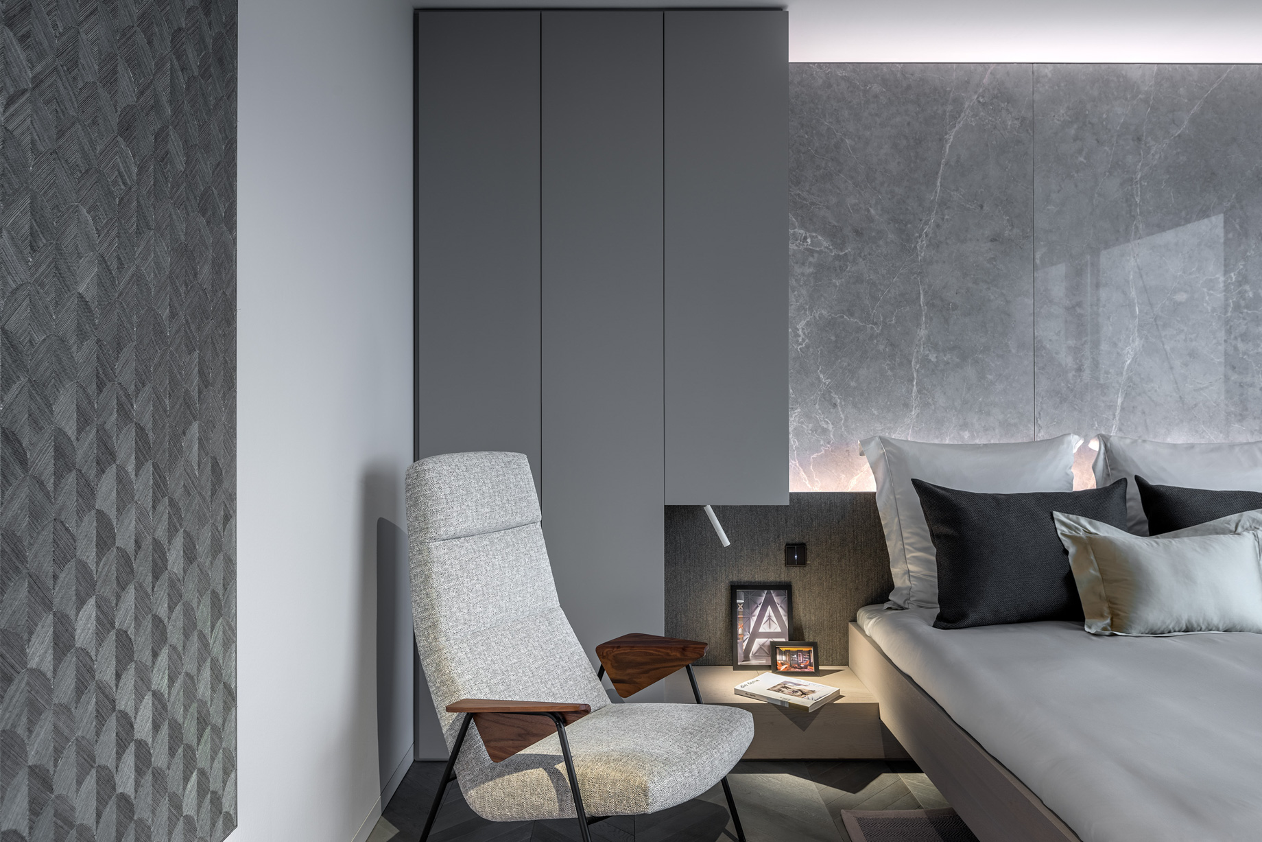 Shades of Grey Apartment Interior Design Shanghai, China – Ippolito Fleitz Group – Bedroom Lounge Chair and Bedside Table