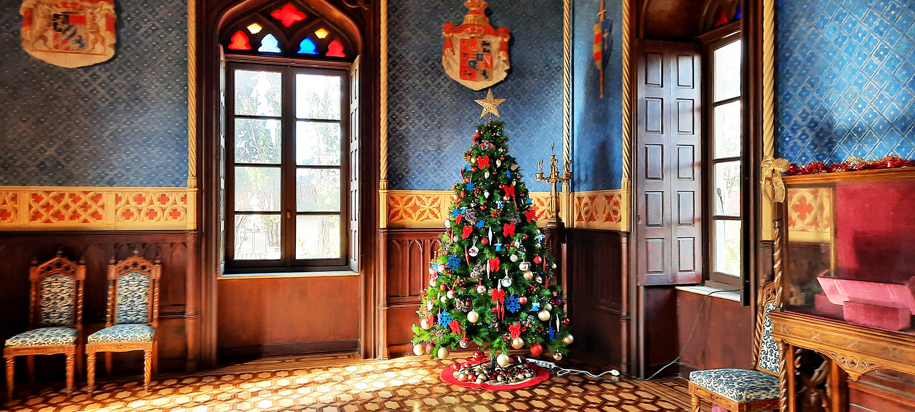 Festive Heraldry Wall Decor in a Castle