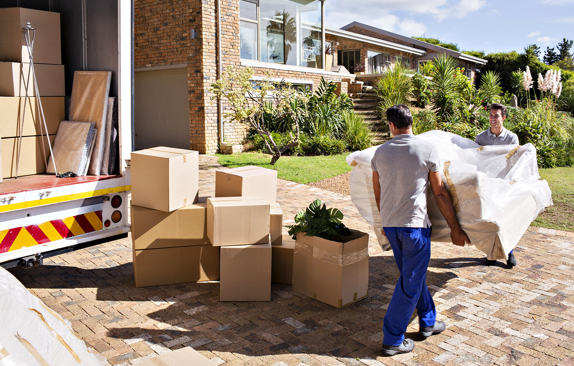 Professional Movers Moving Furniture