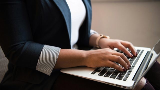 Woman on MacBook