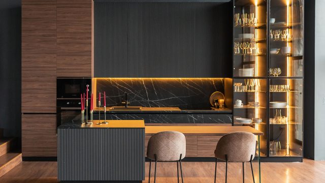 Contemporary Luxury Kitchen in Modern Style with Wood, Dark Grey, and Gold Interior Elements