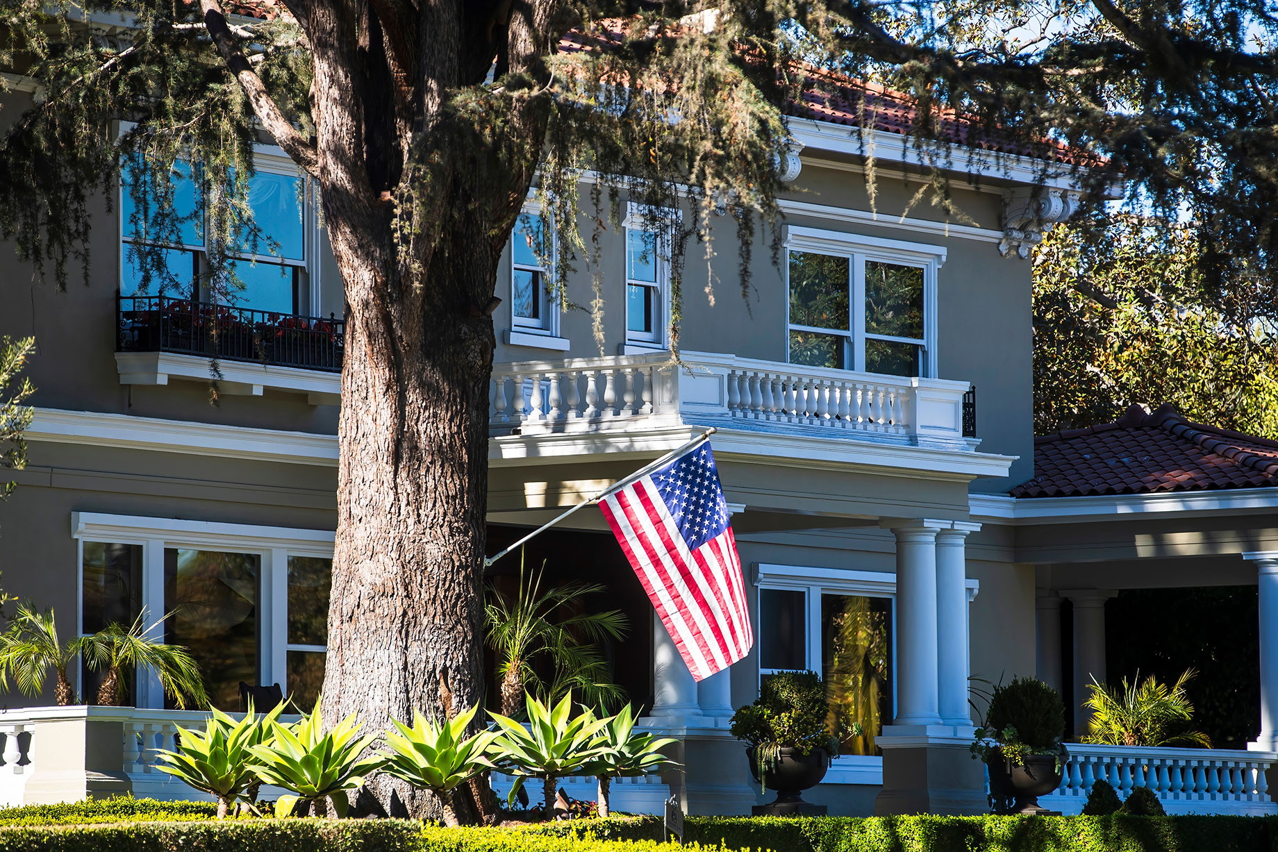 Traditional House with an American Flag in Los Angeles, California, USA