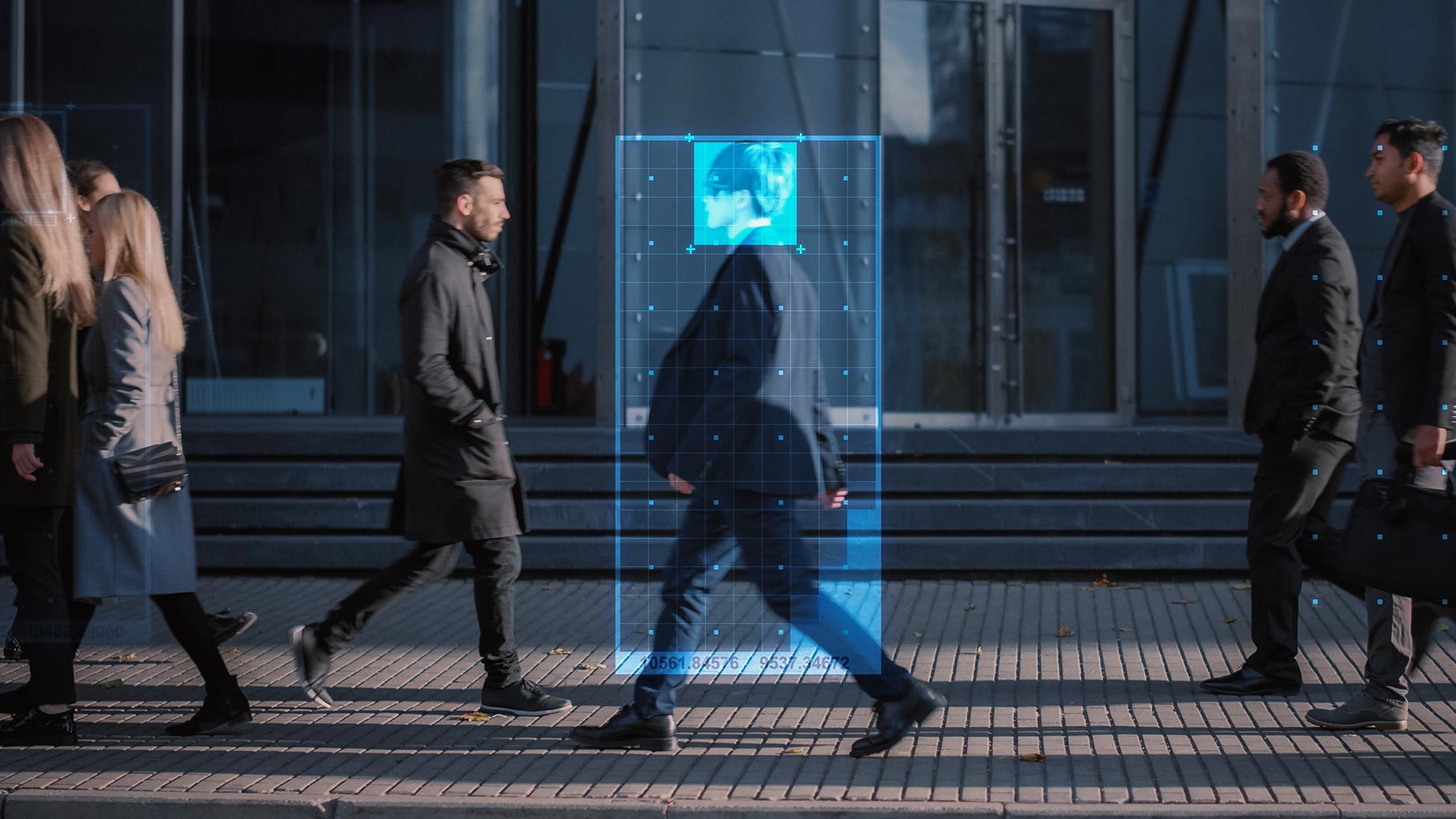 Crowd of Business People Tracked with Advanced Technology Walking on Busy Urban City Street