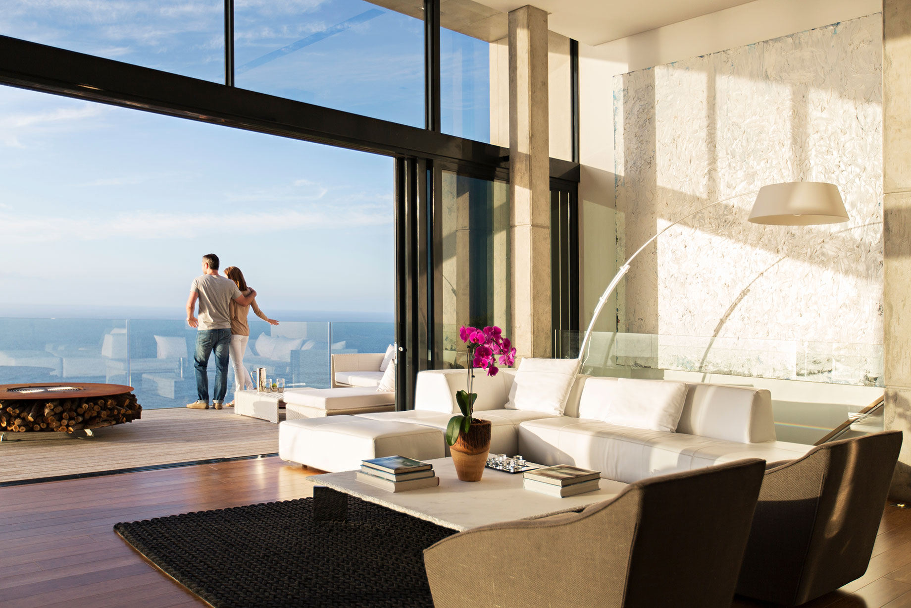 Couple on Balcony of Modern Ocean View Luxury Home