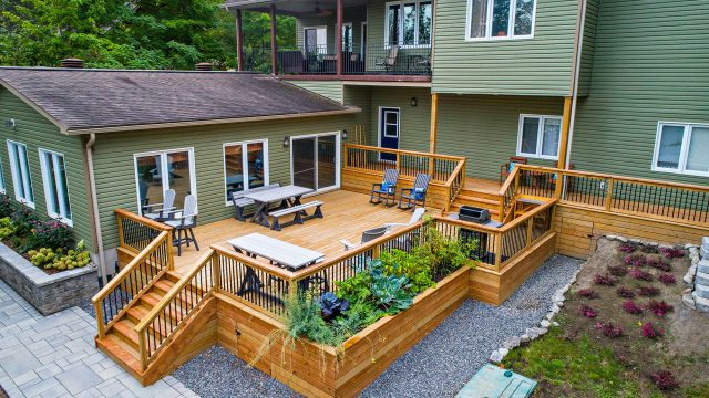 Large Backyard Deck at a Green House