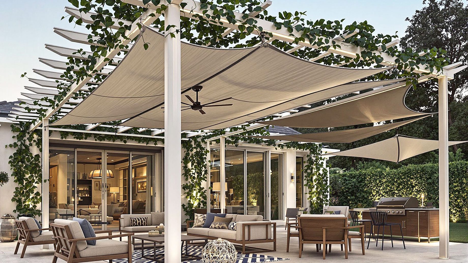 A luxurious patio featuring a stylish pergola with climbing plants, retractable awnings, modern shade sails, and a motorized canopy, furnished with upscale outdoor furniture and soft lighting.