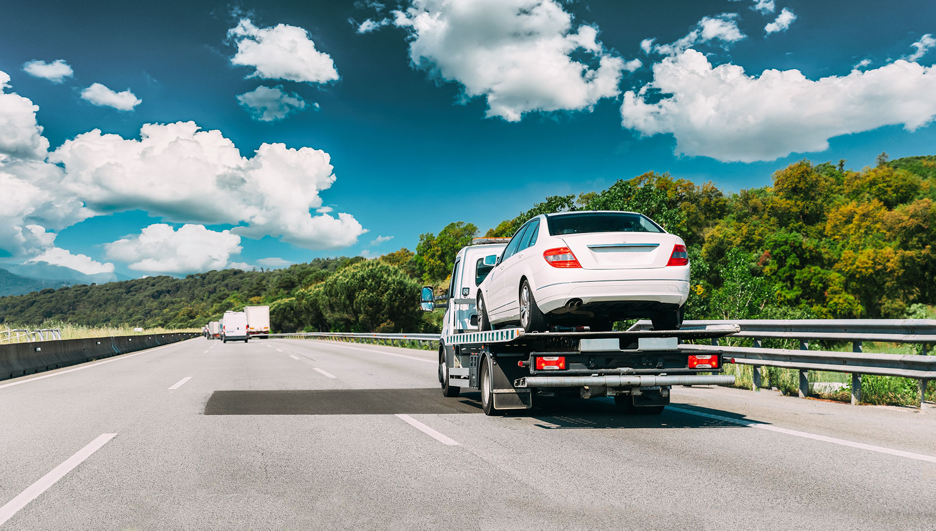 Tow Truck Transporting a Car