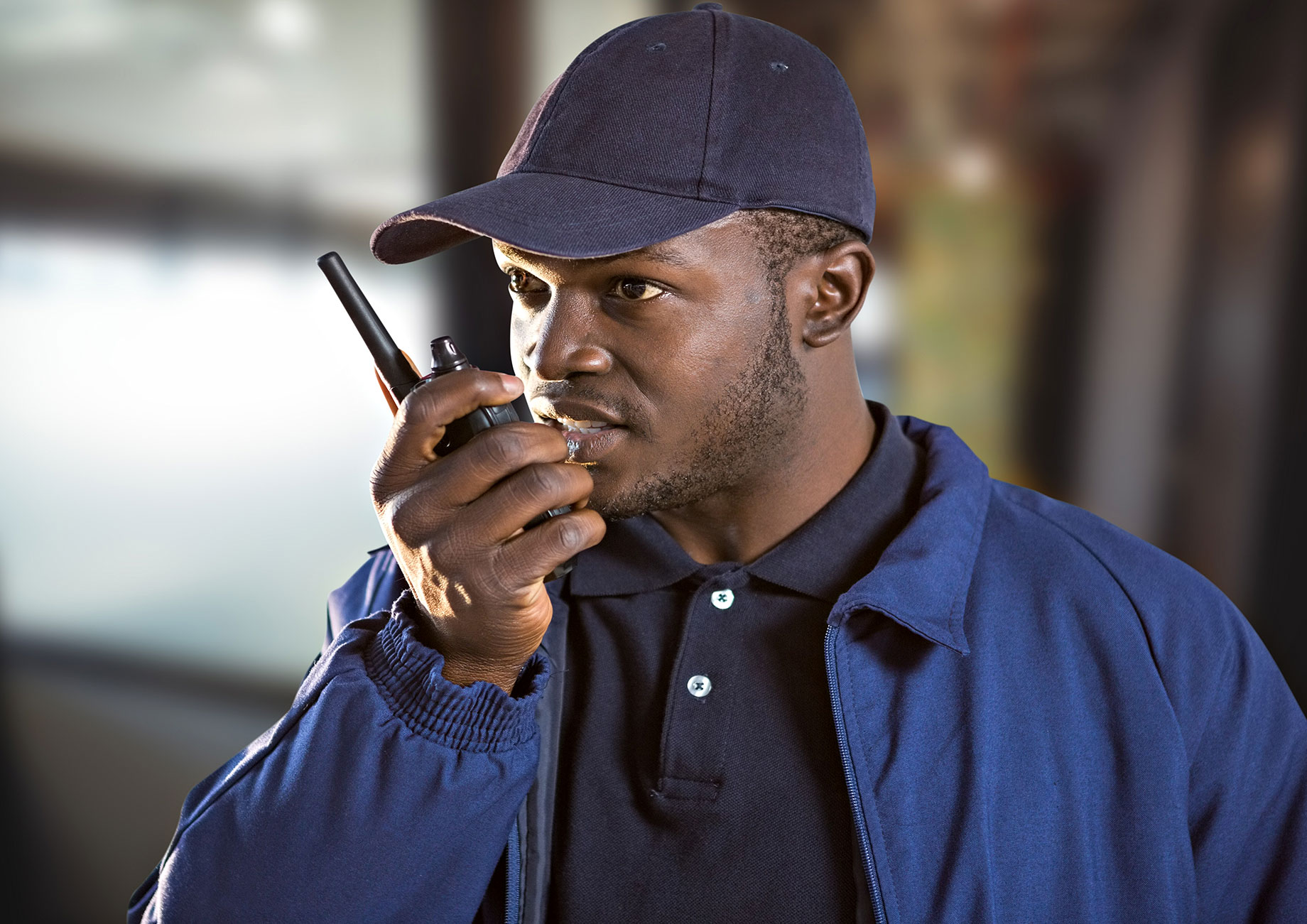 Man Using a Walkie-Talkie