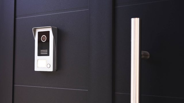 Entrance Door to a House with a Doorbell and Camera