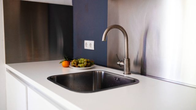 Kitchen with Metal Backsplash