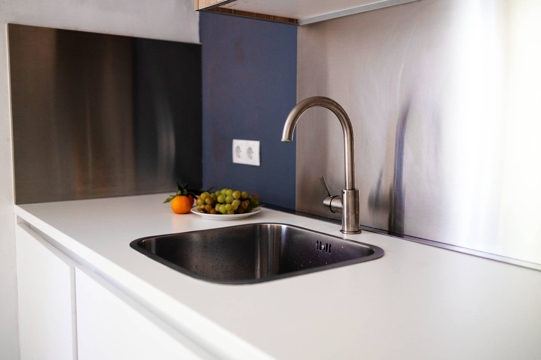 Kitchen with Metal Backsplash