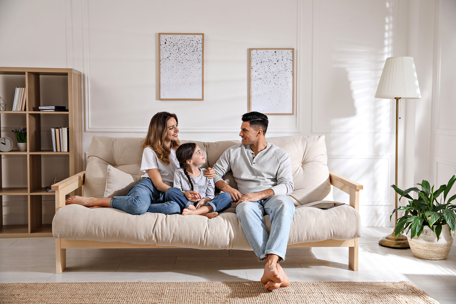 Modern Comfort Living with Mother, Father, and Daughter