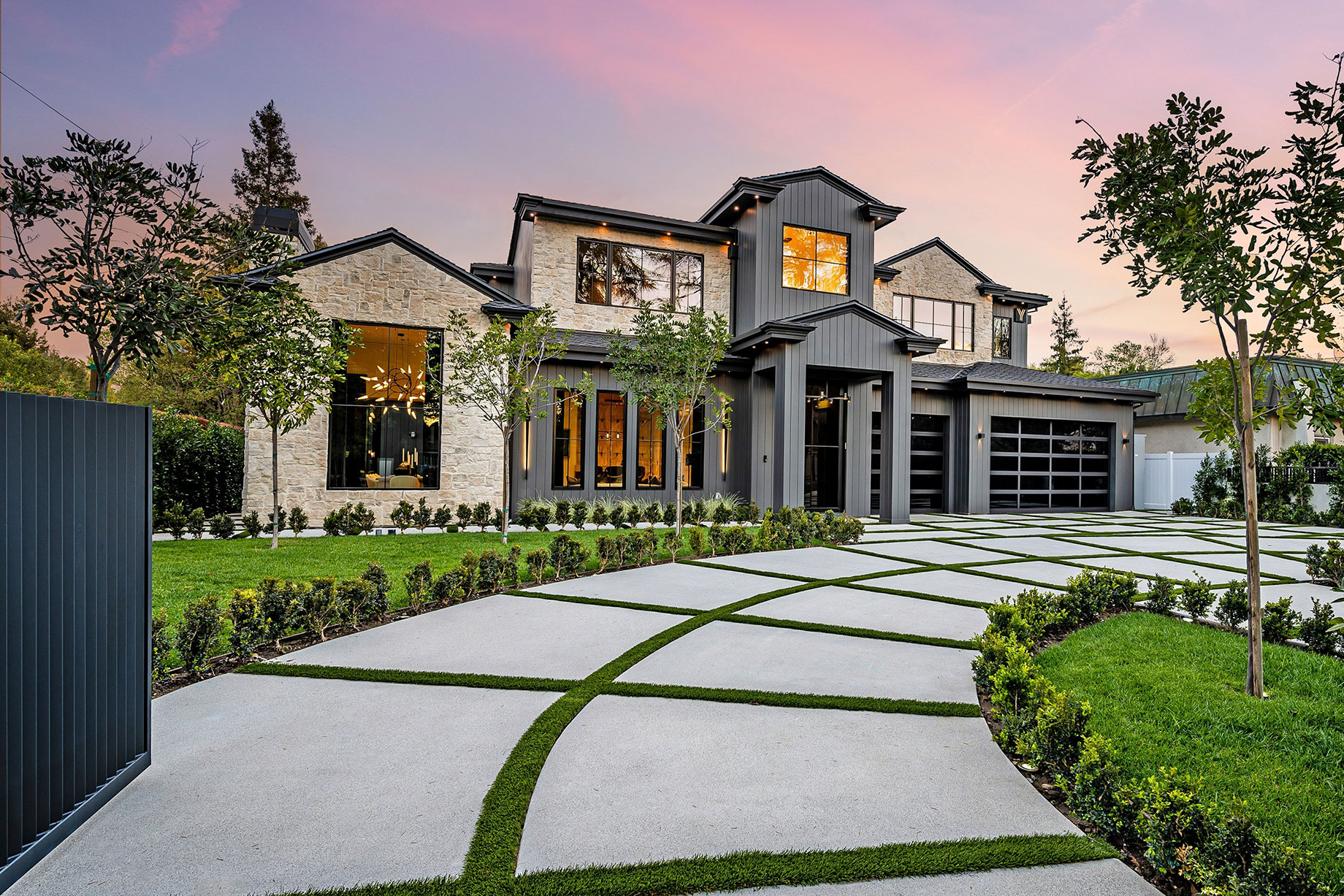 Modern Luxury Home Exterior with a Well-Manicured Lawn