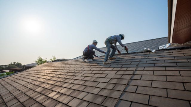 Professionals Replacing a Roof