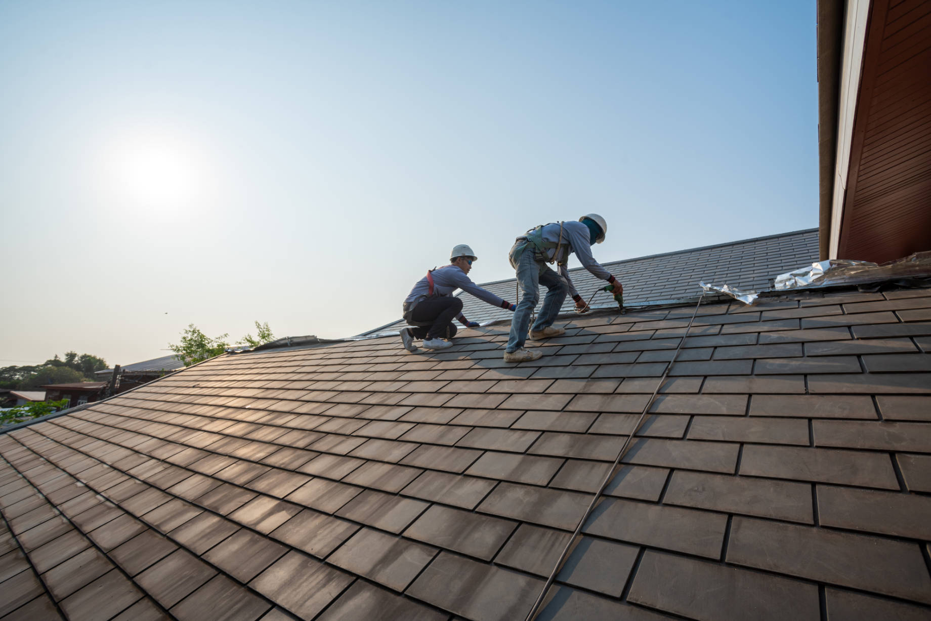 Professionals Replacing a Roof