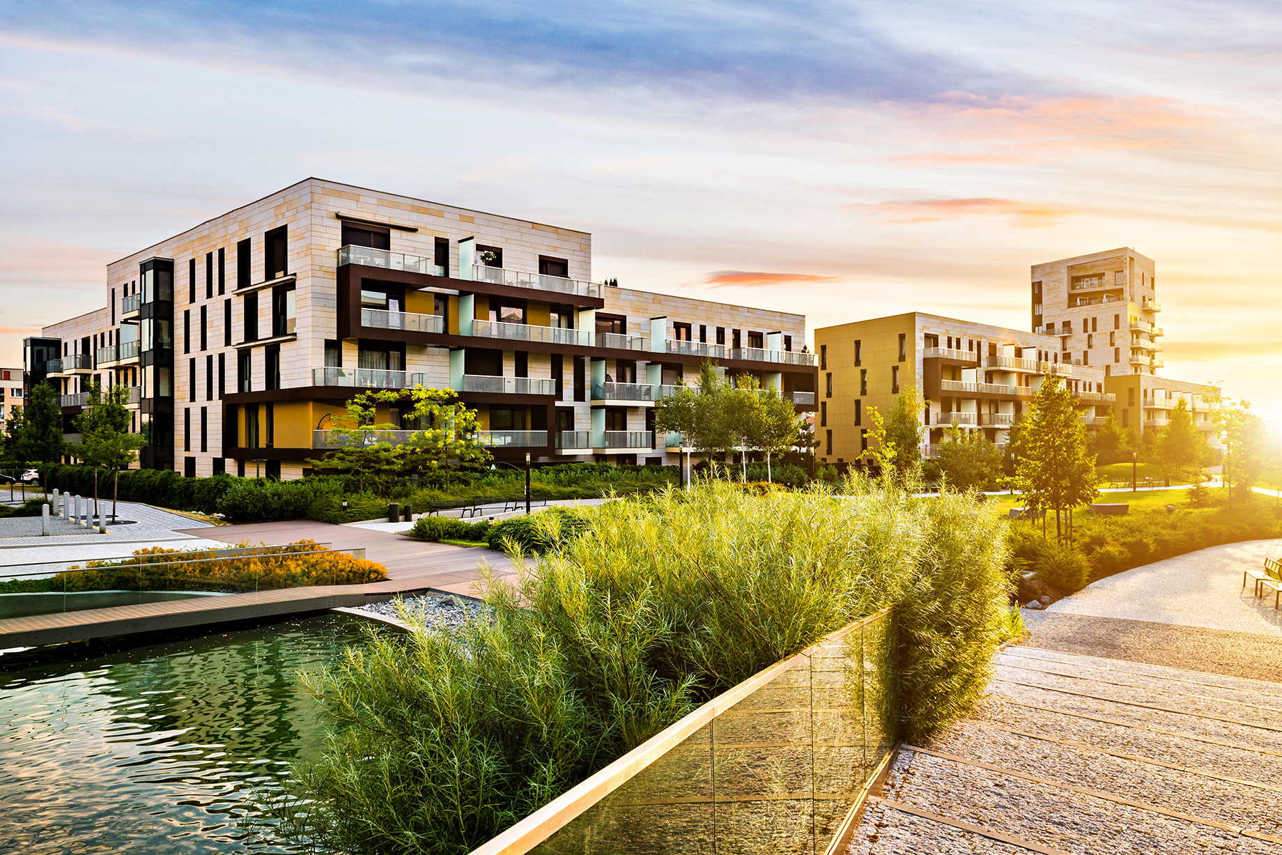 Residential Apartments in a Public Green Park during Sunrise