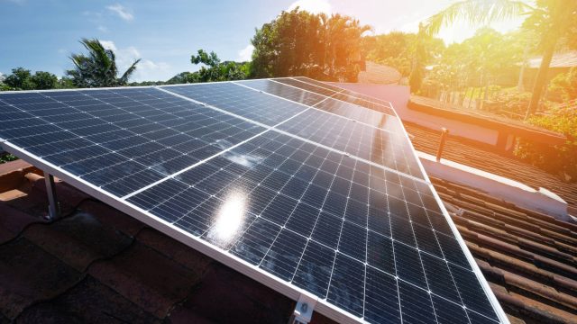 Solar Panels on the Roof of a House on a Sunny Day