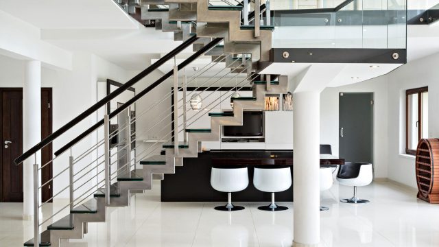 Two-Level Luxury Apartment with Stairs Made of Glass and Steel
