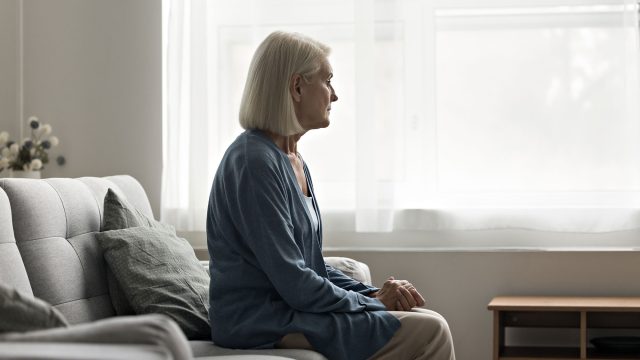 Woman Grieving On Her Own