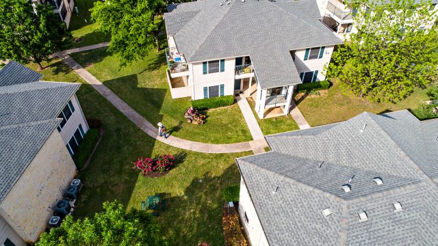 Aerial View of Landscapers and Rooftops of Urban Housing in Austin, Texas, USA
