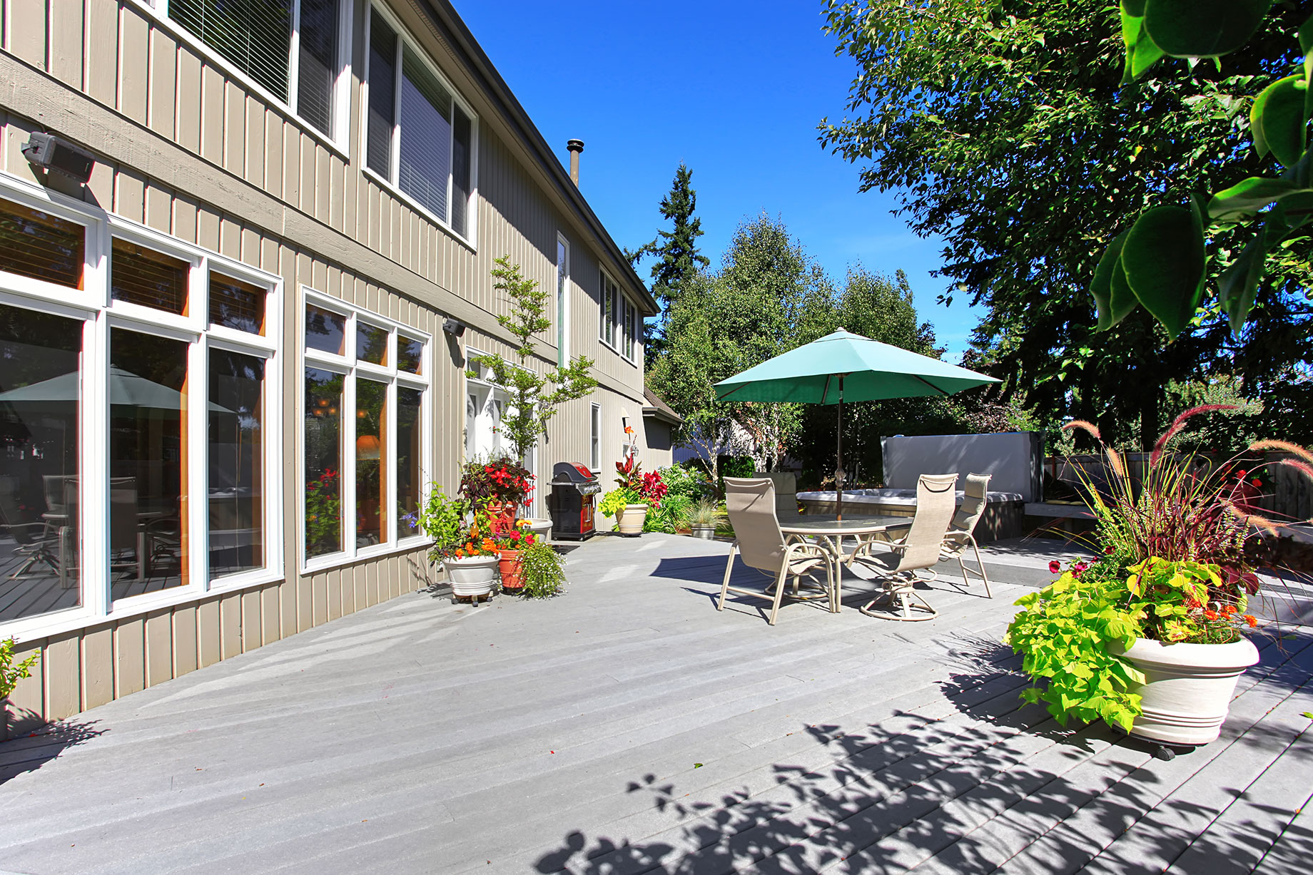 Backyard Patio with Table Set and Jacuzzi