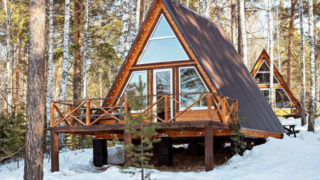 Contemporary Winter Country House in the Forest with Snow