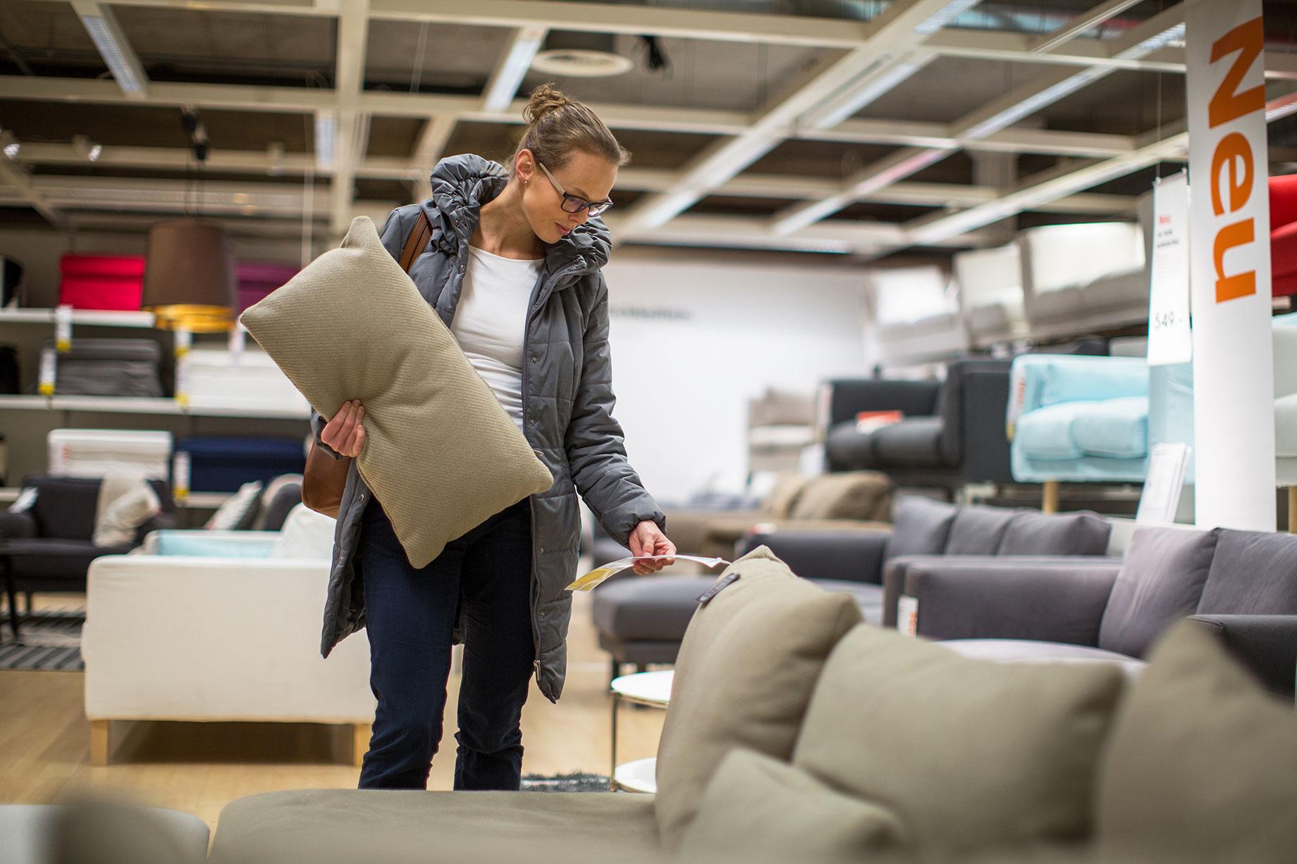 Female Customer Looking at Furniture in IKEA