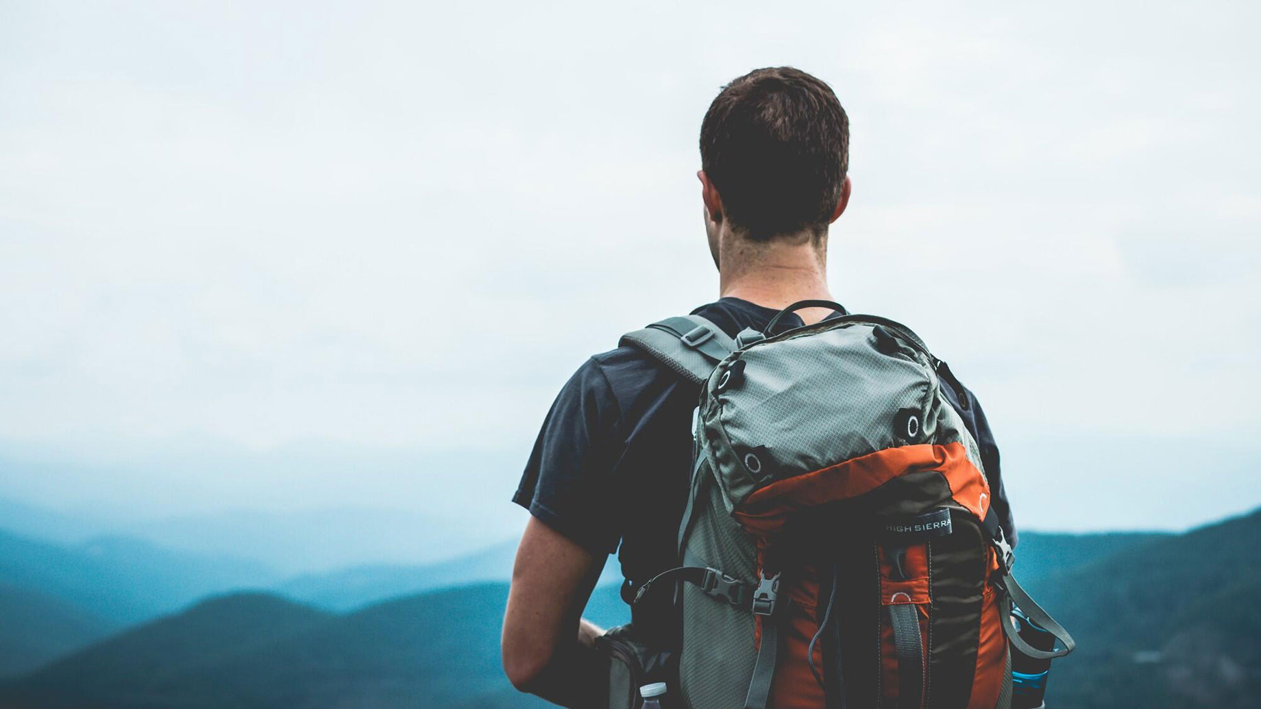 Hiking in the Mountains with a Backpack