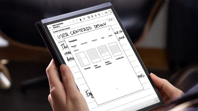 Holding a Digital Notebook Tablet