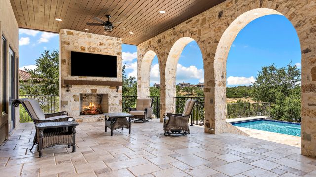 Outdoor Covered Patio with Fireplace and Pool