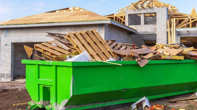 Roll Off Dumpster on a House Construction Site