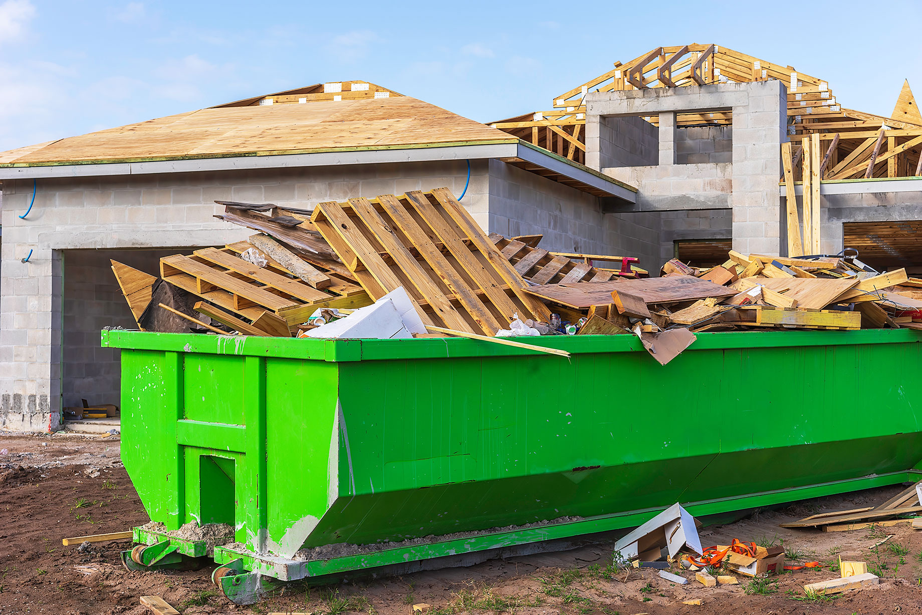 Roll Off Dumpster on a House Construction Site