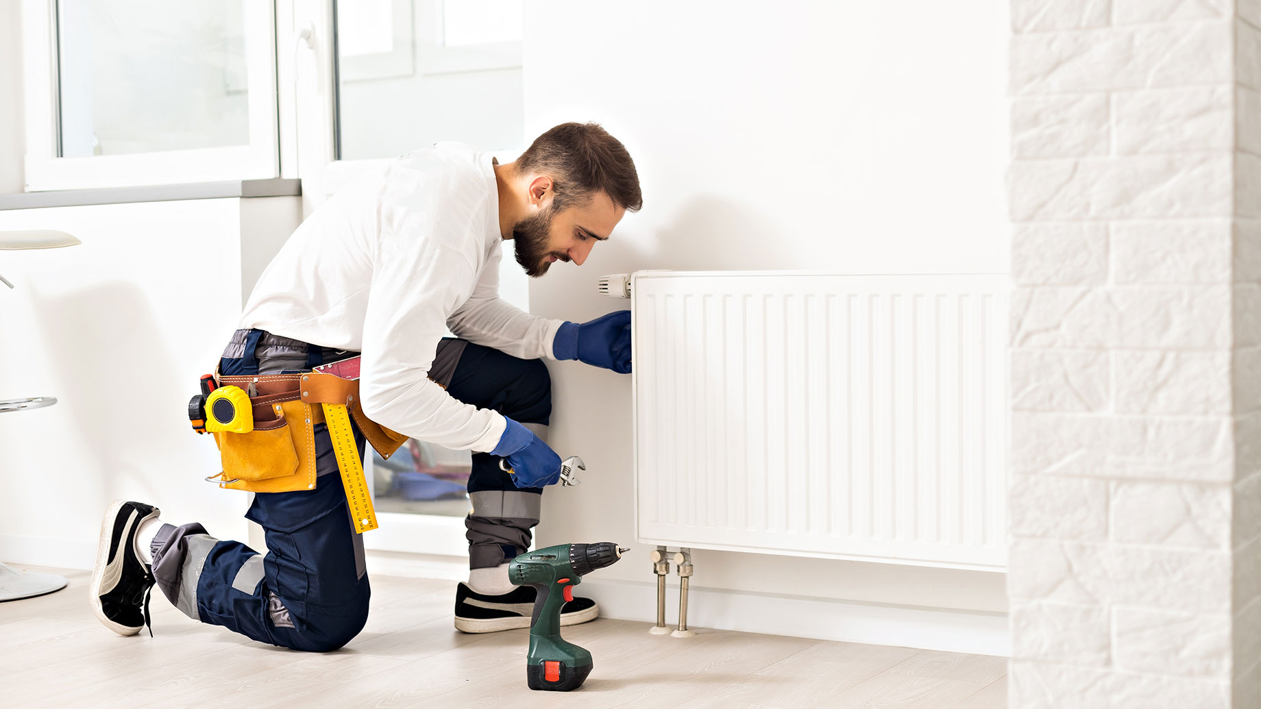 Technician Tuning Up a Heater