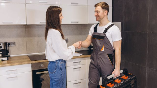 Trusted Plumber with Client