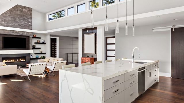 Open Concept Floor Plan with Kitchen, Living Room with Fireplace, and Ceiling Windows