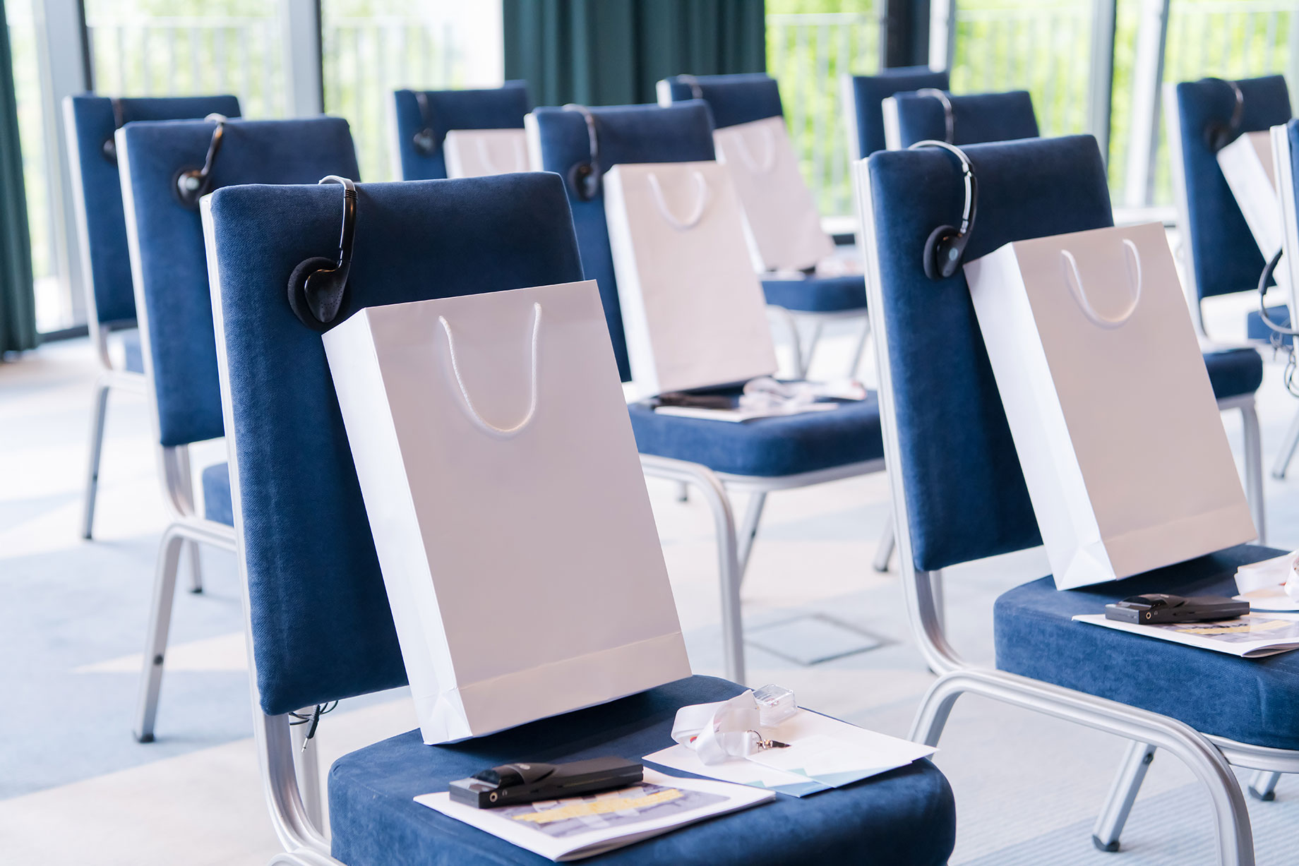 Corporate Gifts on Chairs for Guests at a Conference