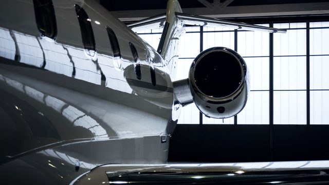 Luxury Business Jet Parked in a Hangar