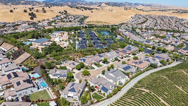 Luxury Homes with Solar Panels on Roofs in the Trilogy 55+ and Older Community in Brentwood, California, Surrounded by Hills, Vineyards, and Mount Diablo
