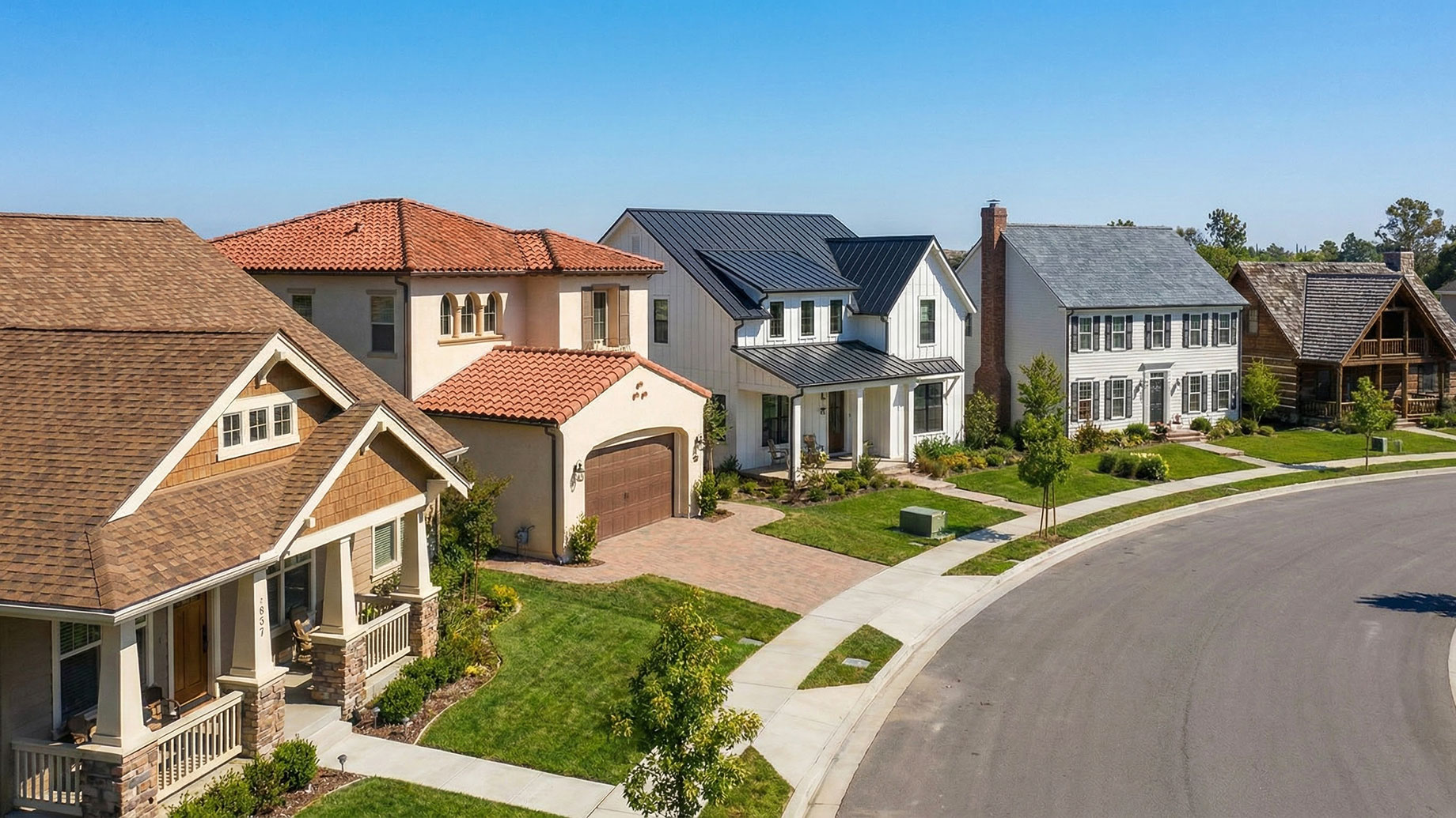 A panoramic view showing a row of homes with different architectural styles, each featuring a distinct roofing material—including terracotta clay tiles, standing seam metal, asphalt shingles, gray slate, and wood shakes—demonstrating how specific roofs complement different house designs.