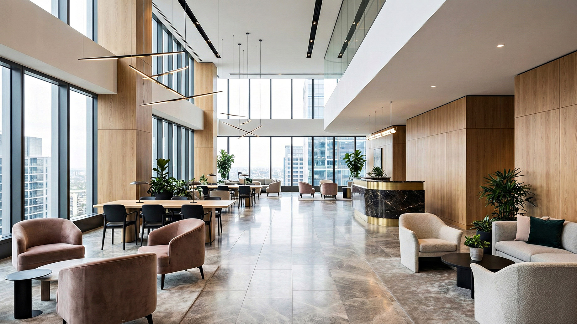 A spacious, modern commercial lobby with high ceilings, polished marble floors, and warm wood-paneled walls. Large floor-to-ceiling windows offer panoramic city views. The space is furnished with contemporary armchairs, sofas, and tables arranged in various seating groups, illuminated by modern pendant light fixtures. A reception desk is visible in the background.