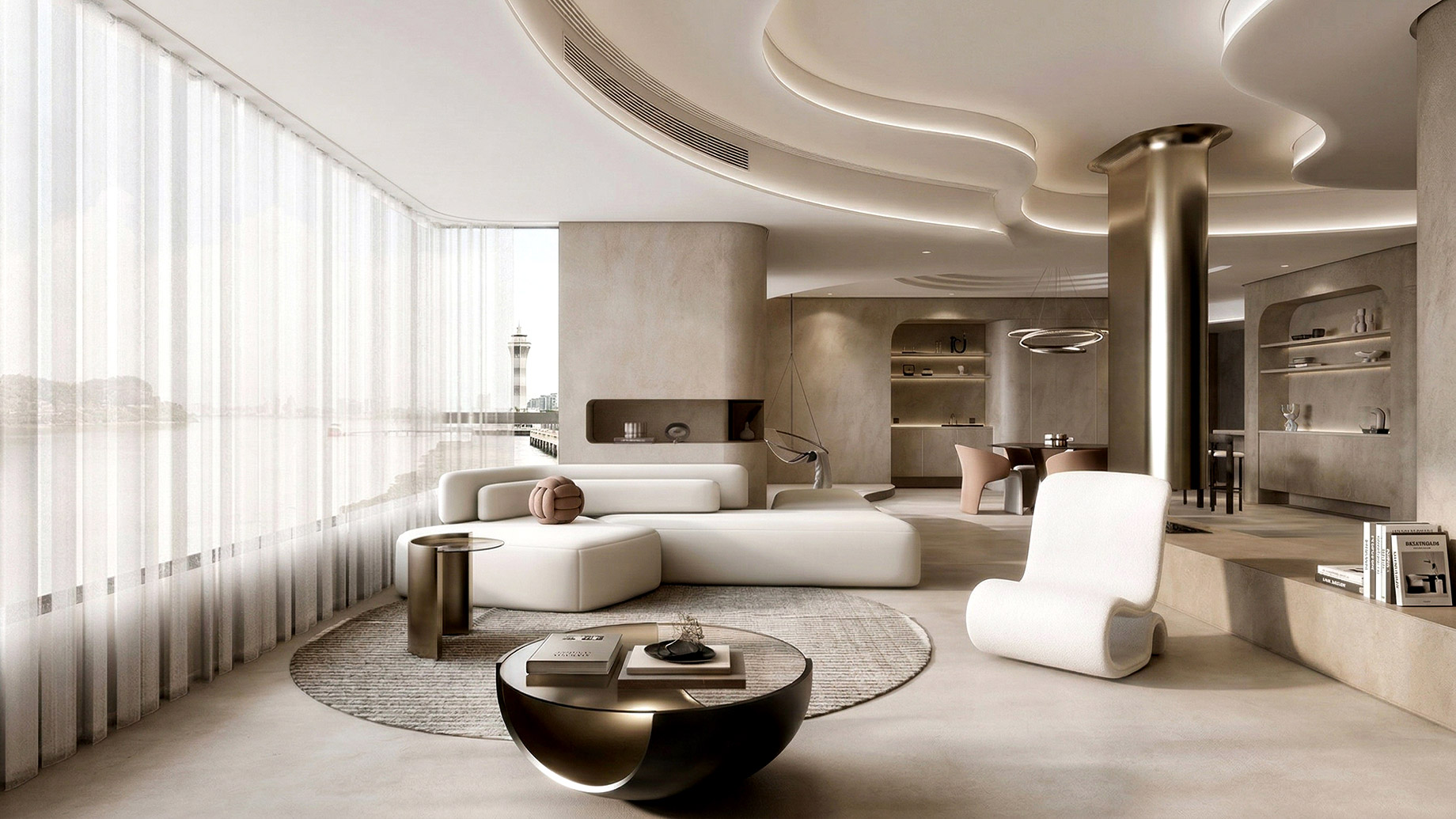 Interior of a luxurious, modern apartment with curved architectural lines and integrated cove lighting. The living space features a large floor-to-ceiling panoramic window with sheer curtains, overlooking a wide body of water with a distant tower. A low-profile, modular white sofa is arranged with a unique sculptural S-shaped chaise lounge, brass side tables, a futuristic coffee table on a round rug, and a coiled art object. In the background, a massive brass-plated column frames a dining area and built-in stone shelves with curated objects. The overall color palette is composed of beige textured walls, polished concrete floors, and warm gold and white accents.